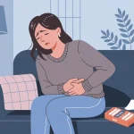 Femme qui a mal au ventre a cause d'un retour de couche